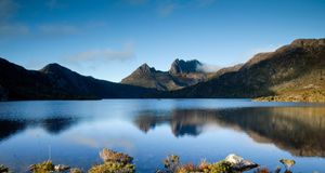 Dawn reflections on calm fresh water lake. Dove Lake, Cradle Mountians, Tasmania, Australia. (© John White Photos/Flickr/Getty Images) &copy; (Bing Australia)