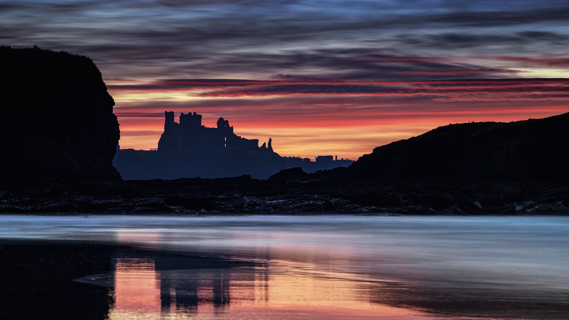 Tantallon Castle at sunset from Seacliff Beach, East Lothian, Scotland