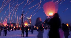 Long-exposure photograph of people launching paper lanterns on International Women's Day, St. Petersburg, Russia (© Yury Goldenshteyn/Corbis) &copy; (Bing New Zealand)