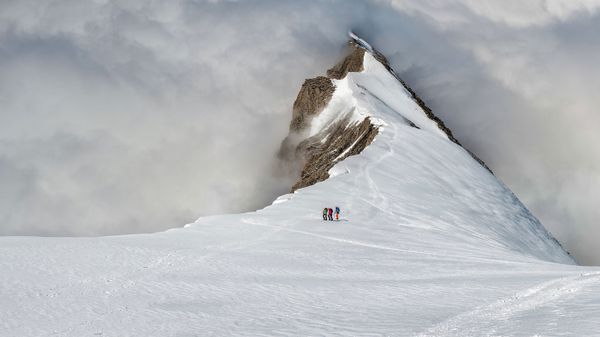 Mountaineers on the Balmhorn in the Bernese Alps of Switzerland