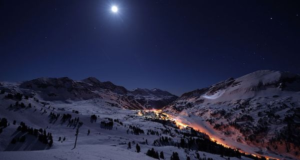 The moon lights up Obertauern in the Alps of Austria