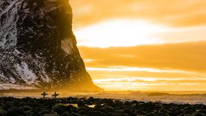 Surfers in the Lofoten Islands, Norway (© Nicolás Pina/Tandem Stills + Motion)(Bing New Zealand)