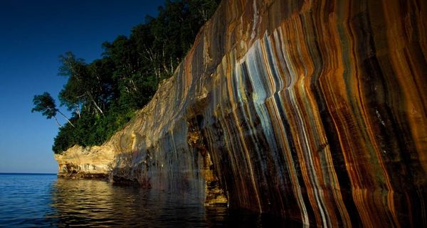 Stained rocks and trees, Rocks National Lakeshore, Munising, Michigan
