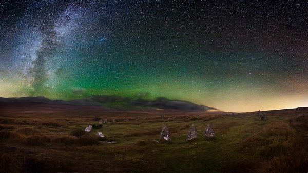 Dartmoor\'s Scorhill Stone Circle under a starry night sky, Devon.
