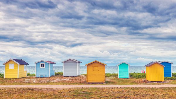 Bathing huts on the beach in Skåne County, Sweden