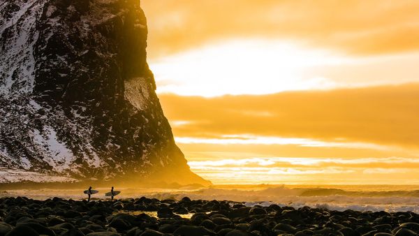 Surfers in the Lofoten Islands, Norway