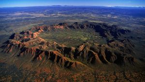Aerial view of Gosses Bluff meteorite crater, Northern Territory (© Ted Mead/Photolibrary/Getty Images)(Bing Australia)