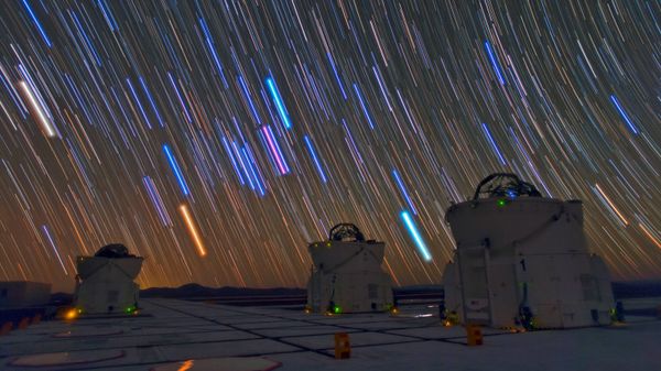 Telescopes and star trails at Paranal Observatory, Atacama Desert, Chile
