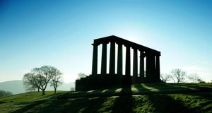 Early morning sun casts long shadows through silhouette of national monument in Calton hill, Edinburgh (© Alexander W Helin/Getty) &copy; (Bing United Kingdom)