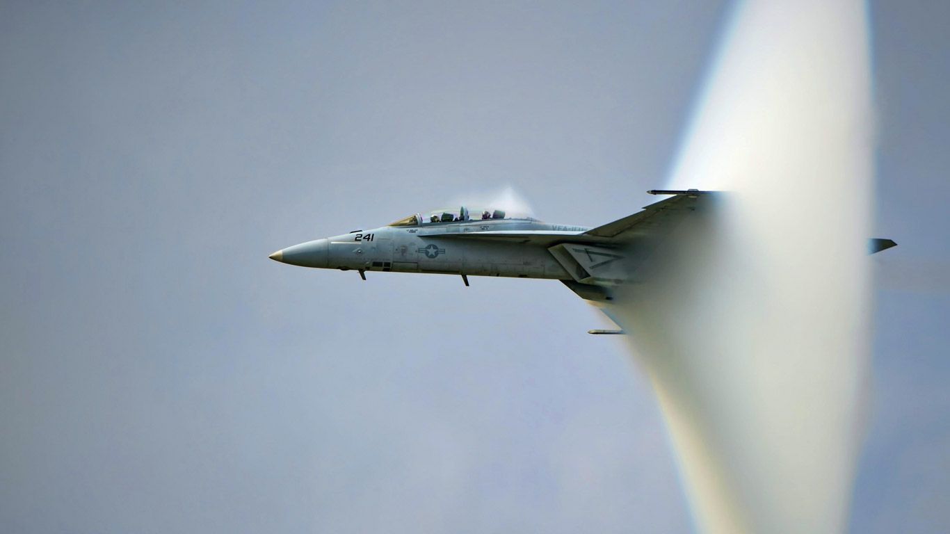 US Navy F/A-18F Super Hornet creating a sonic boom