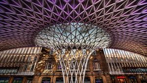 Lattice architectural detail in the concourse at King‘s Cross train station, London, England (© Think James Photo/Gallery Stock)(Bing New Zealand)