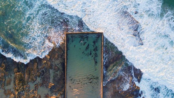Aerial view of Cronulla rock pool with incoming waves, New South Wales