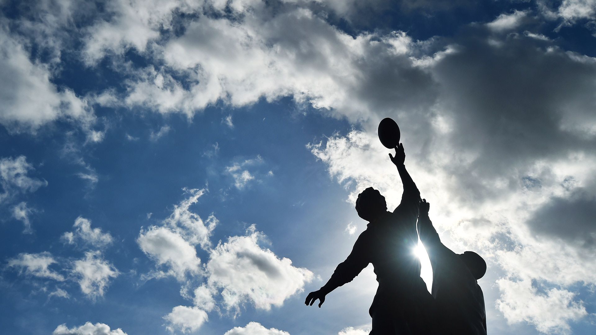 Bronze statue of a rugby line-out by British sculptor Gerald Laing outside Twickenham Stadium, south-west London
