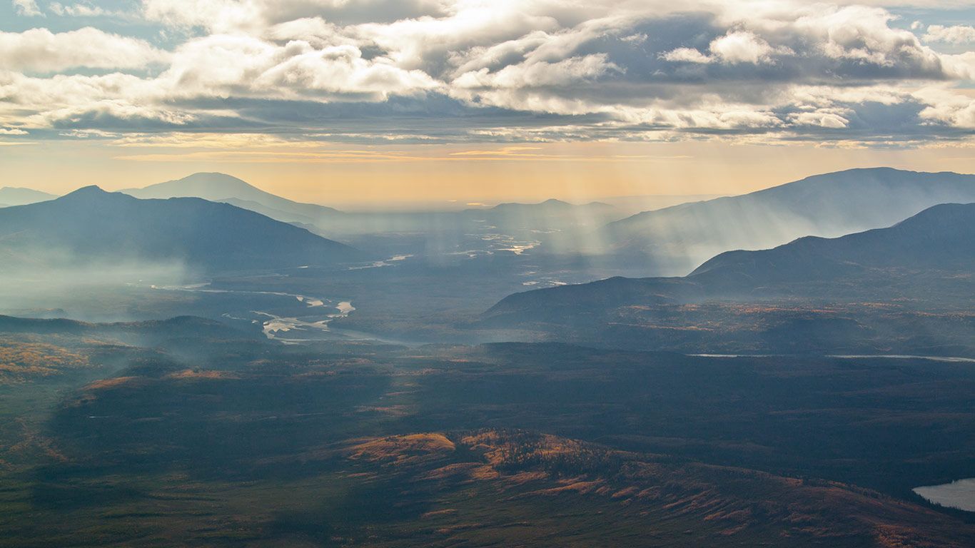 The Jackknife Mountains and river valley viewed from an airplane in NWT