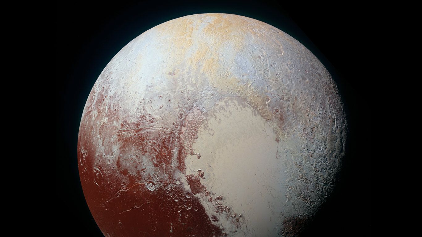 A colour-enhanced photo of Pluto, taken by NASA’s New Horizons spacecraft