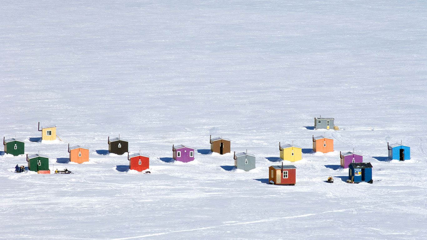 Ice fishing huts in L'Anse-St-Jean, Quebec, Canada
