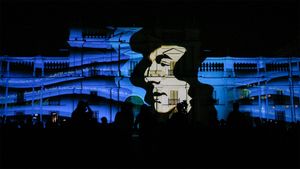 Portrait of poet Pablo Neruda projected on a building, Santiago, Chile (© Mario Tellez/Anadolu Agency/Getty Images)(Bing United States)