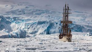 The Europa sails the Penola Strait, Antarctic Peninsula, Antarctica (© Colin Monteath/Minden Pictures)(Bing New Zealand)