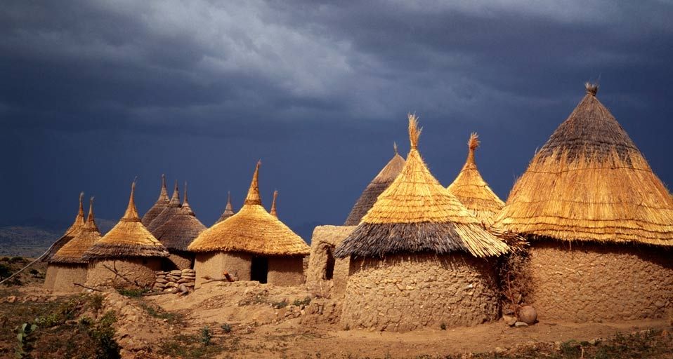 Round adobe huts with straw roofs in the Mandara Mountains, Cameroon