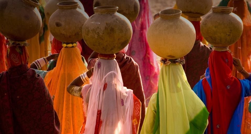 Women carrying pots, Rajasthan, India
