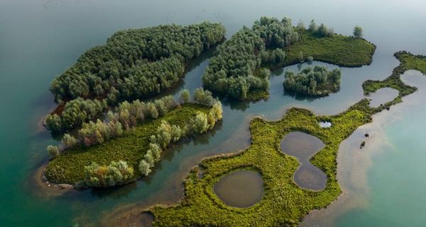 Aerial view of islands in a sand quarry, Jumieges, Seine Valley, France