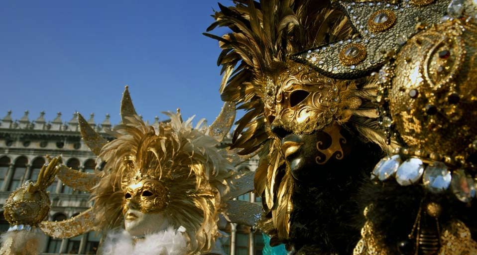 Two persons wearing Carnival masks in Venice, Italy