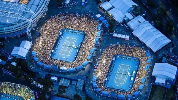 Dusk aerial view of Rod Laver Arena at the Australian Open tennis tournament