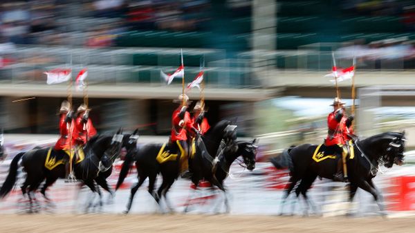 The Royal Canadian Mounted Police Musical Ride at the Calgary Stampede Rodeo in Calgary