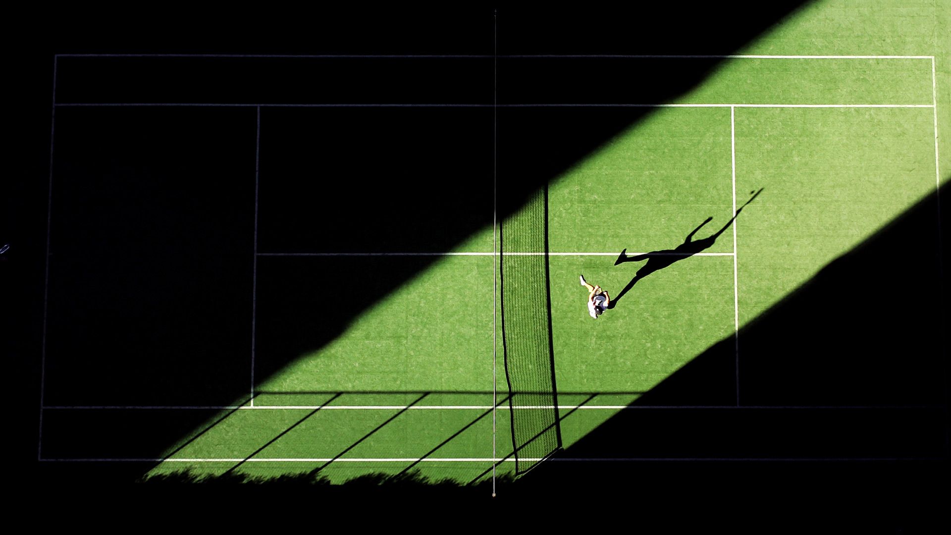 An aerial shot of a tennis match for the opening day of the 2019 Wimbledon Championships