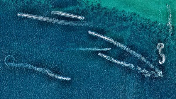 Aerial view of jet skis in the ocean, Australia