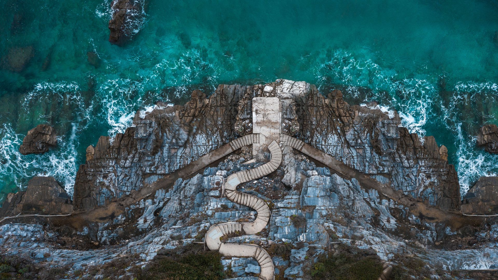 Stairs on the shoreline at Mylopotamos, Thessaly, Greece
