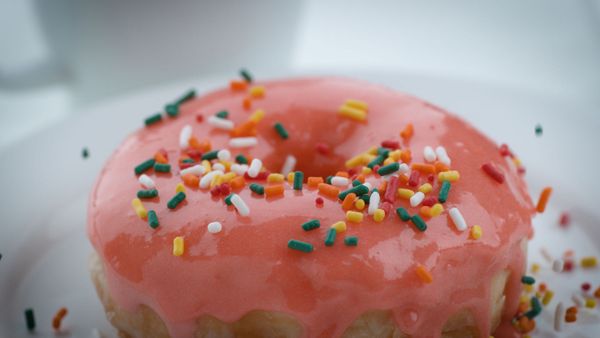 A glazed doughnut with sprinkles