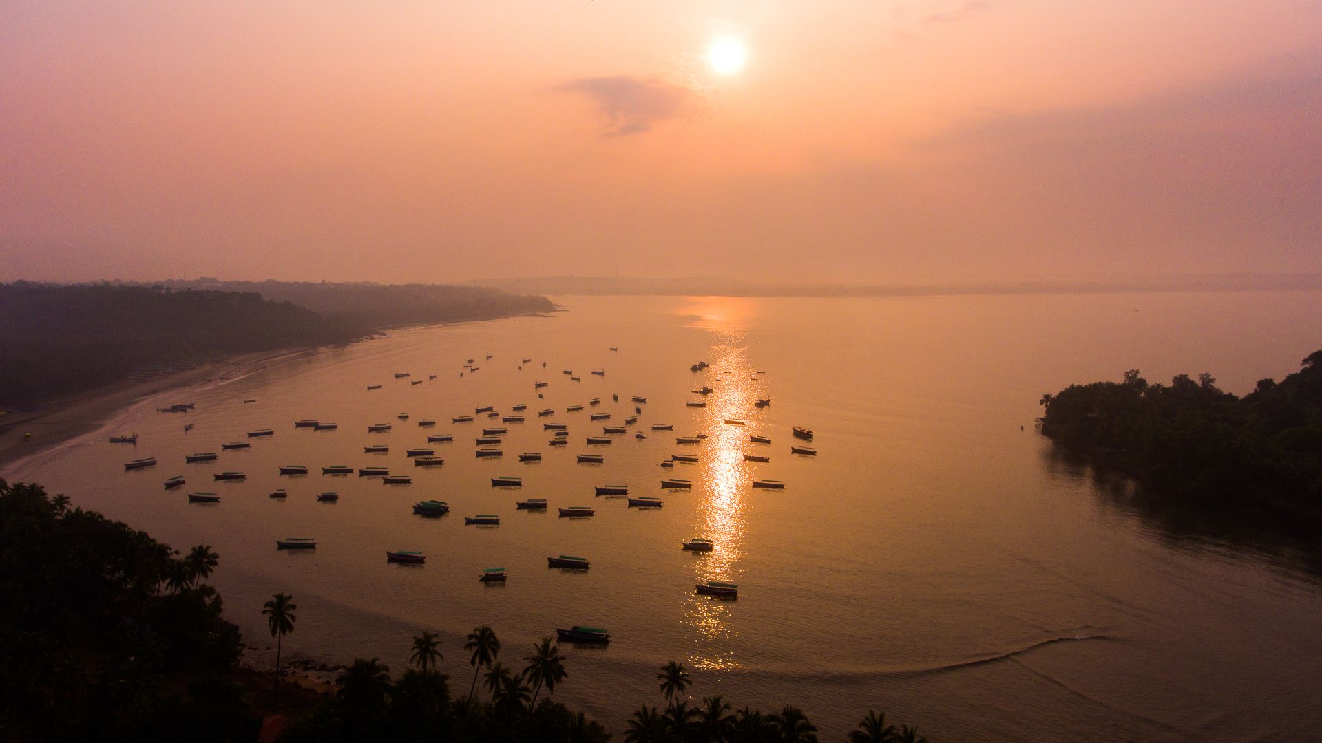 Fishing boats at Coco Beach in Goa, India