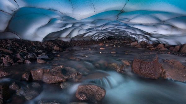 Ice cave and stream in Oregon's Three Sisters Wilderness, USA