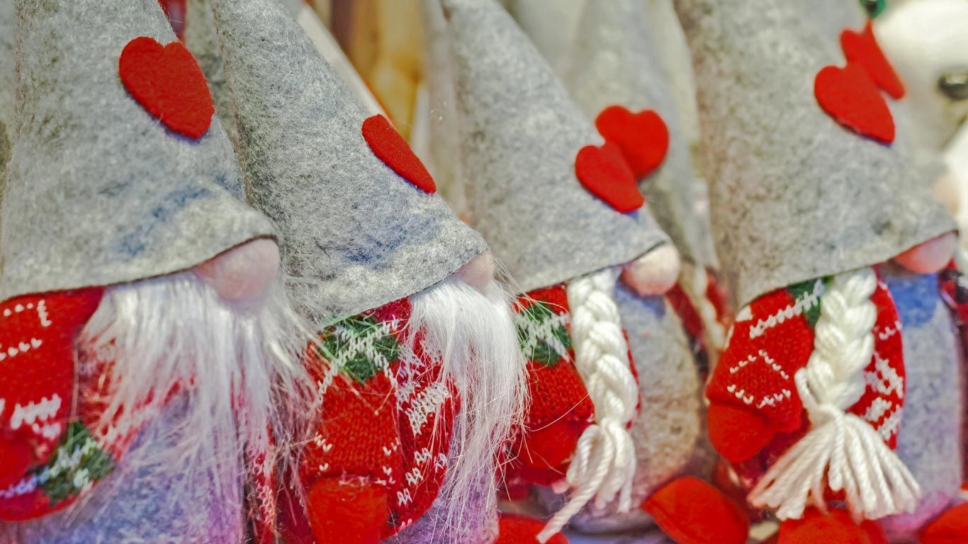 Gnomes for sale at a Christmas market in Pergine Valsugana, Italy