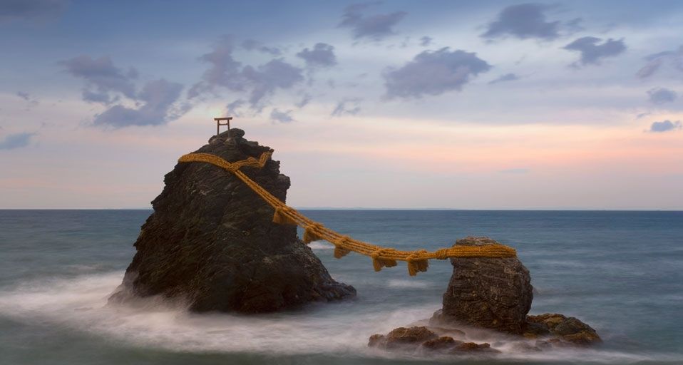 Meoto-Iwa (Wedded Rocks), two rocks considered to be male and female and joined in matrimony by sacred ropes, renewed in a special festival each year, Honshu, Japan