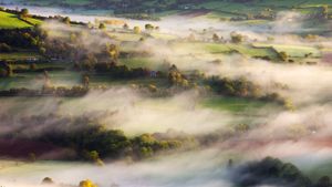 Mist blows over rolling countryside near Talybont-on-Usk in Brecon Beacons National Park, Wales (© Adam Burton/Alamy)(Bing United Kingdom)