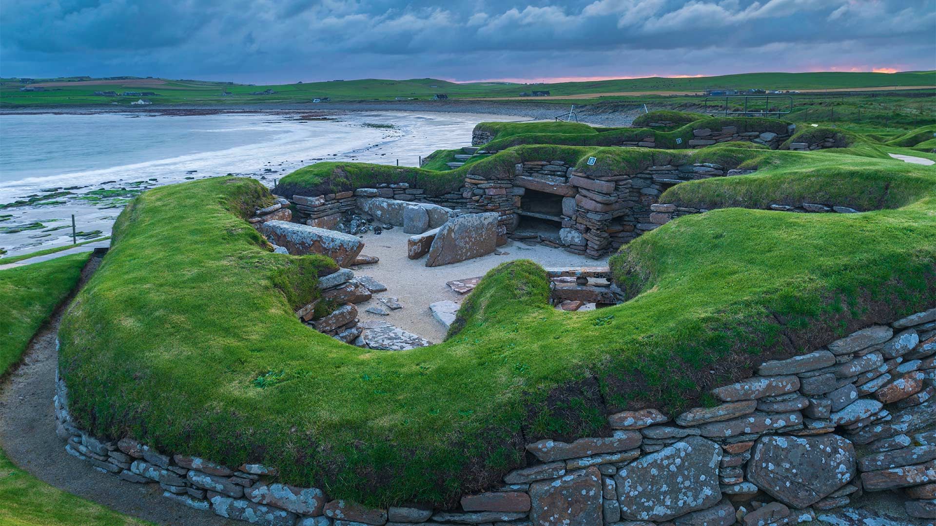 Stormy sky over Skara Brae, a Neolithic village on the Mainland, Orkney