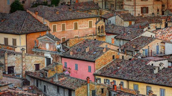 Rooftops in the walled city of Urbino, Italy
