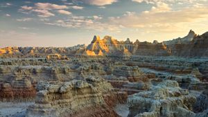 Sunset over Badlands National Park, South Dakota, United States (© Petr Bednarik/Danita Delimont/Alamy Stock Photo)(Bing Australia)