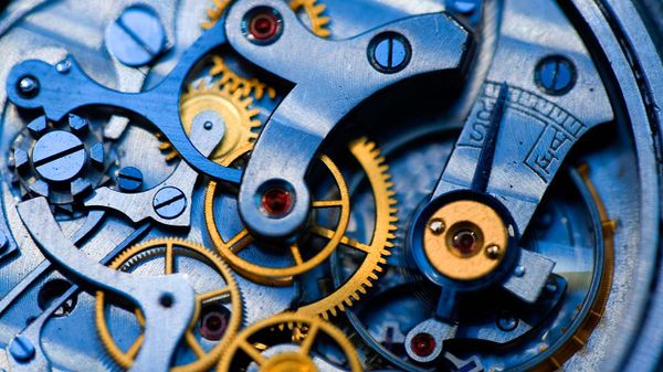 Gears and rubies inside an antique watch