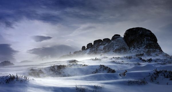 Dawn breaks on foggy morning in Dartmoor, Devon, England, UK
