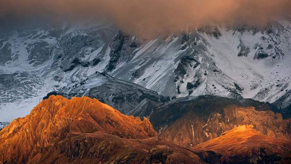 Sunlit ridges against volcanic scree on Eyjafjallajökull, Iceland