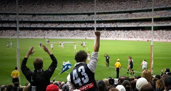 Supporters at AFL game, Melbourne Cricket Ground, Victoria, Australia