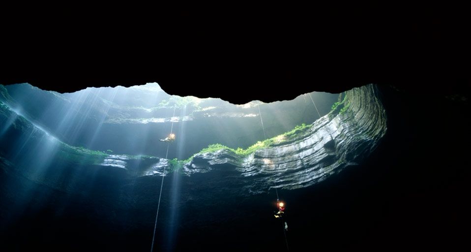 People spelunking in Neversink Pit, Jackson County, Alabama