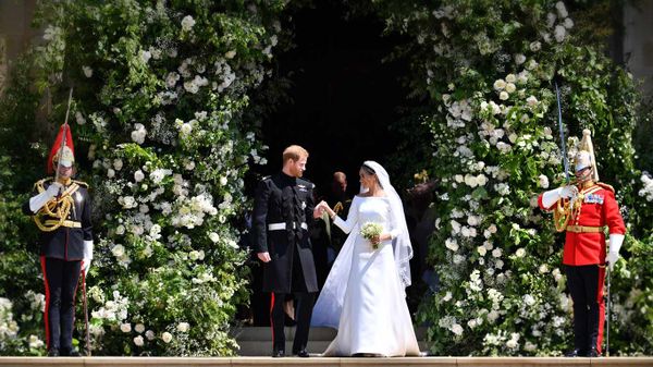 Prince Harry and Meghan Markle leave after their wedding ceremony at St. George's Chapel in Windsor Castle in Windsor