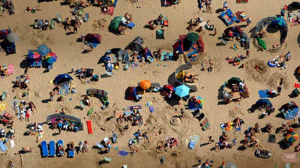 Crowds at Weymouth Beach in Dorset, England