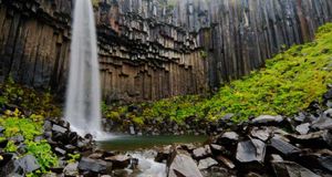 Svartifoss waterfall flanked by hexagonal basalt columns in Vatnajökull National Park, Iceland (© Martin Moos/Lonely Planet Images) &copy; (Bing United States)