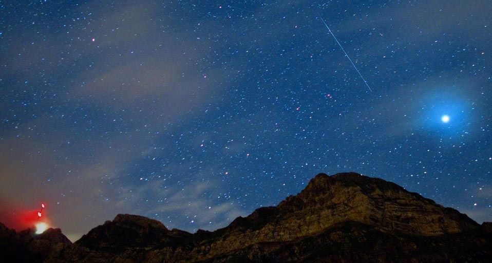 A shooting star above the Säntis mountain in Schwägalp, Switzerland