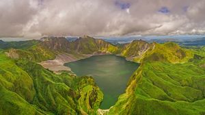 Aerial view of volcanic Lake Pinatubo and mountains, Luzon, Philippines (© Amazing Aerial Agency/Offset by Shutterstock)(Bing United States)